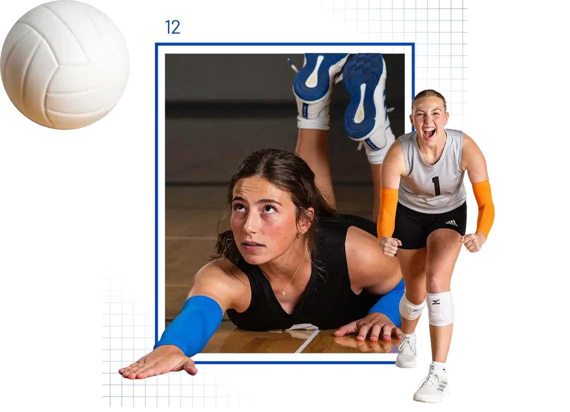 Two volleyball players, one going in for a pancake and the other cheering